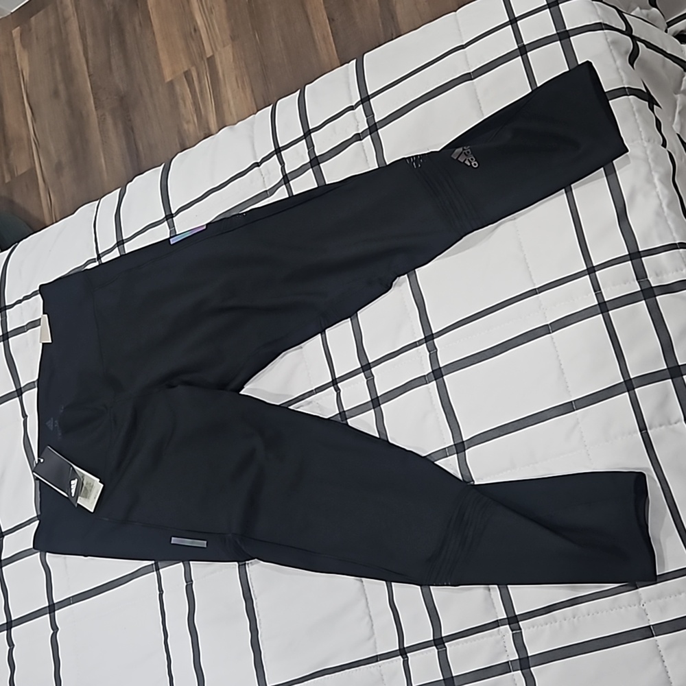 Adidas How We Do Tights. 7/8 length in black with back zipper key pocket